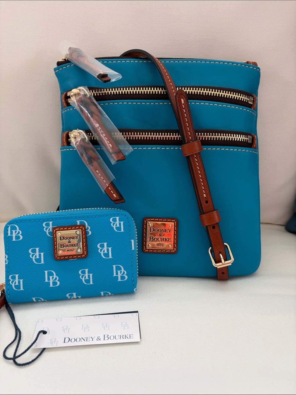 Dooney & Bourke Turquoise Leather Crossbody with Brown Trim and Matching Wallet